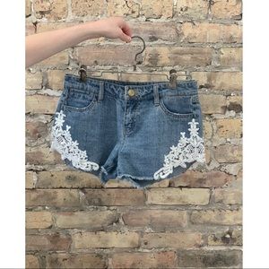 Denim jean shorts with lace embellishment